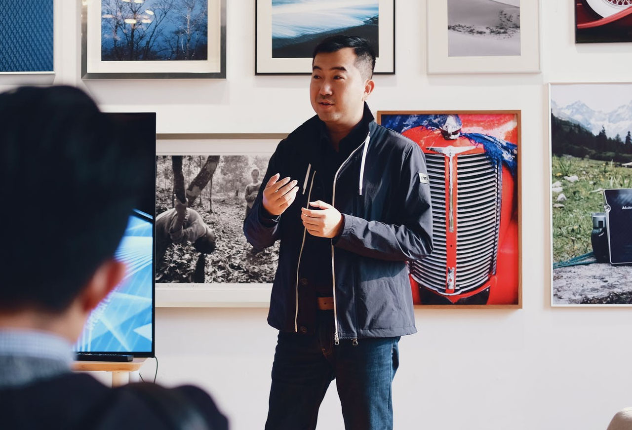 A man speaking to a group