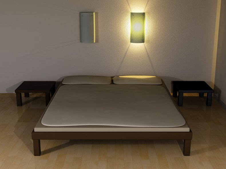 bedroom with a wall-mounted light fixture attached